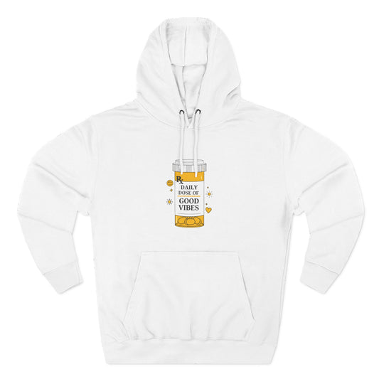 White hoodie with a daily dose of good vibes design on a white background 