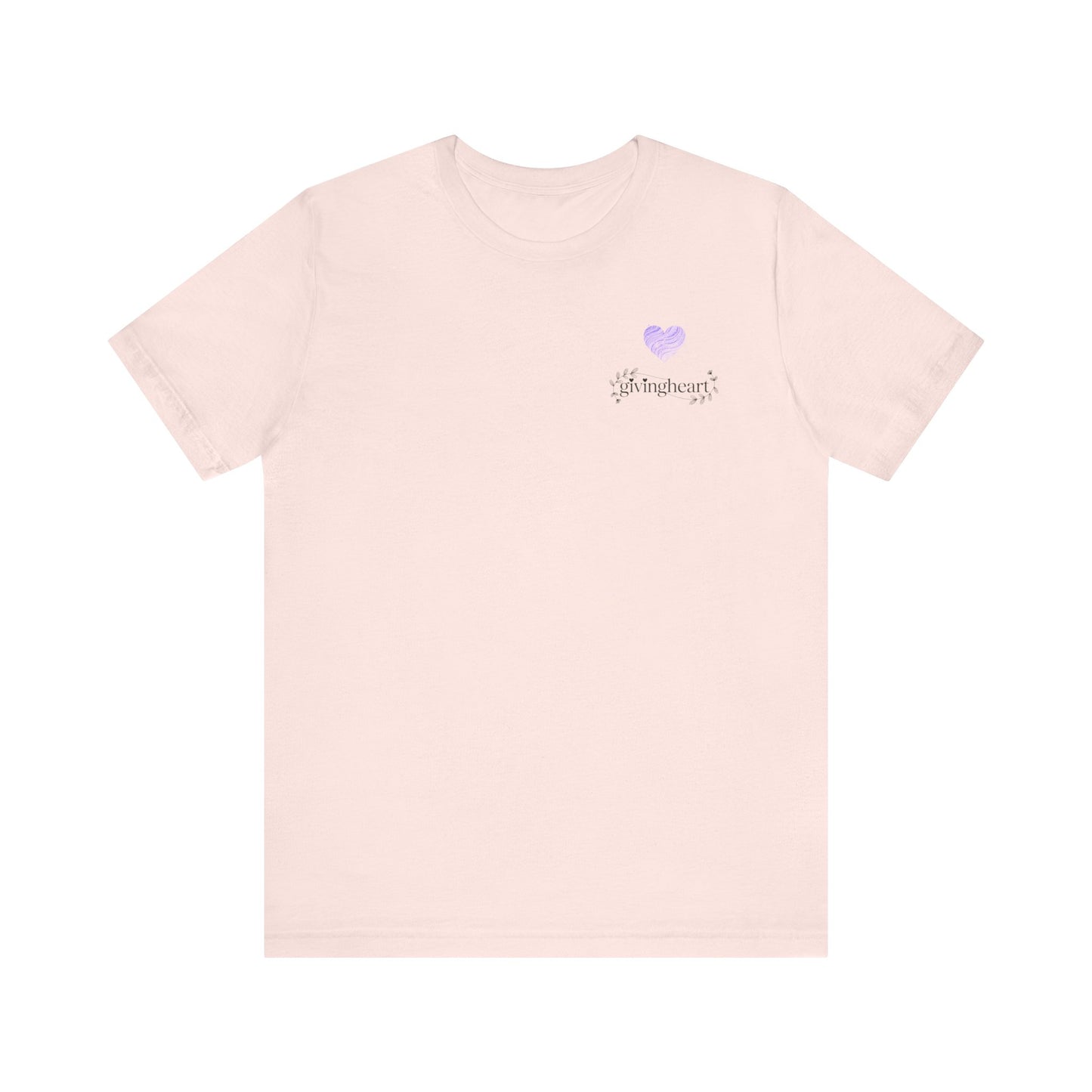 Pink t-shirt with a small  lilac heart logo on a white background