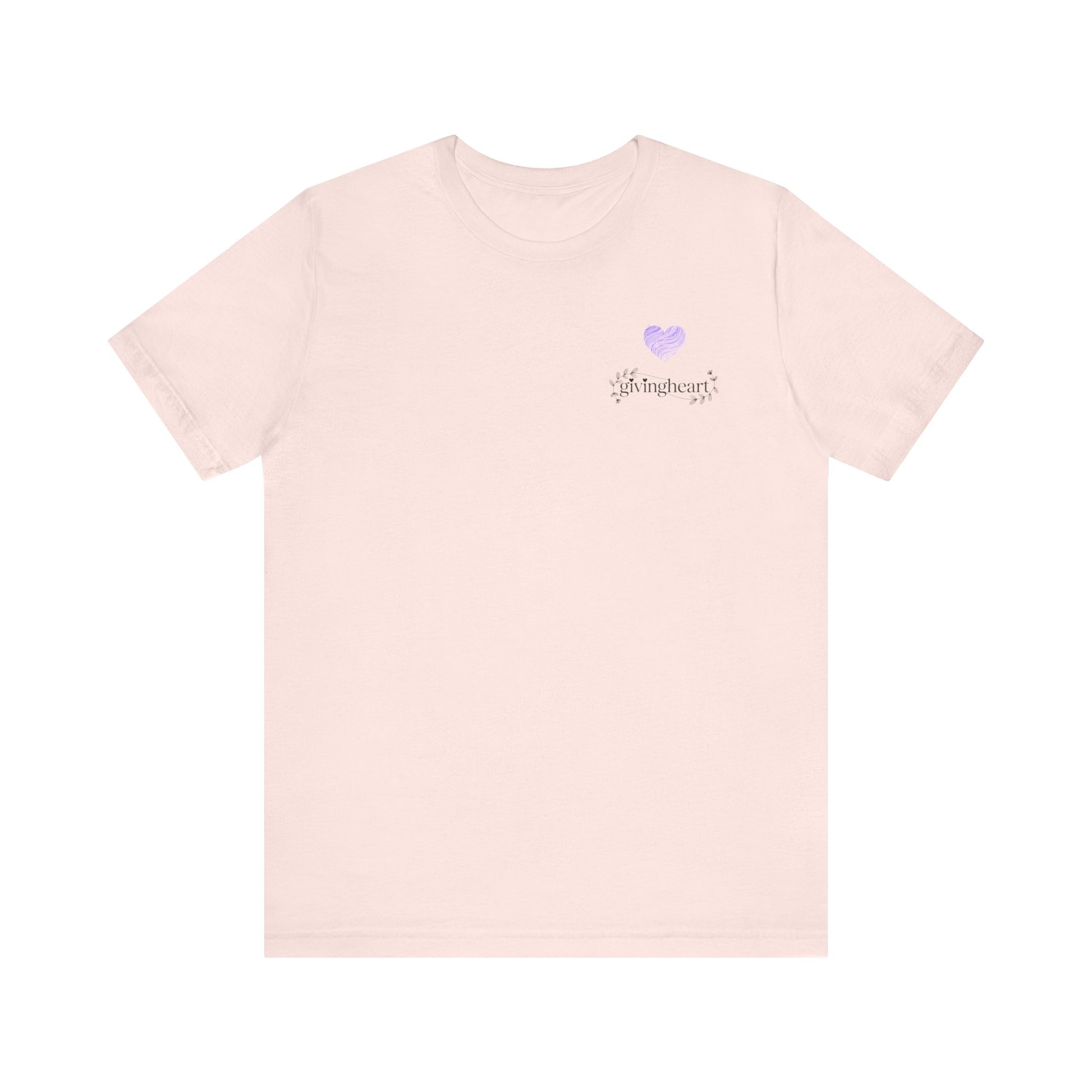 Pink t-shirt with a small  lilac heart logo on a white background