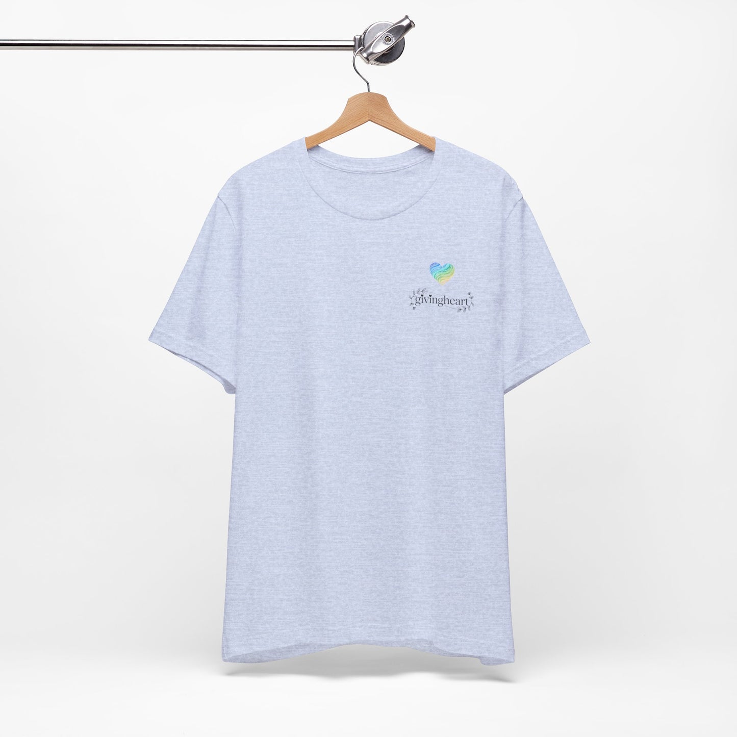 Light blue t-shirt with aa blue/green/yellow logo on a hanger against a white background